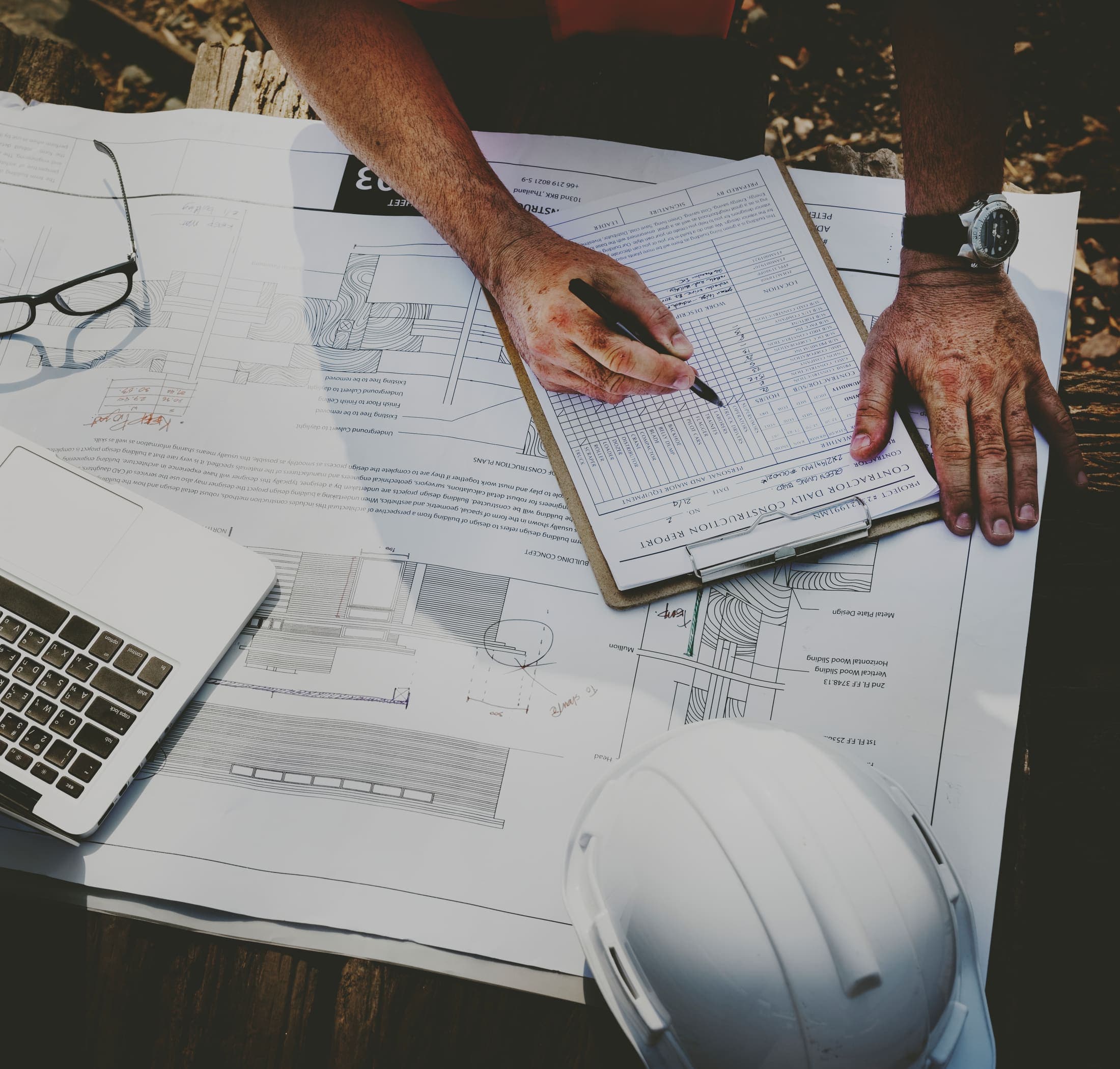 Engineer reviewing technical exhibition specifications