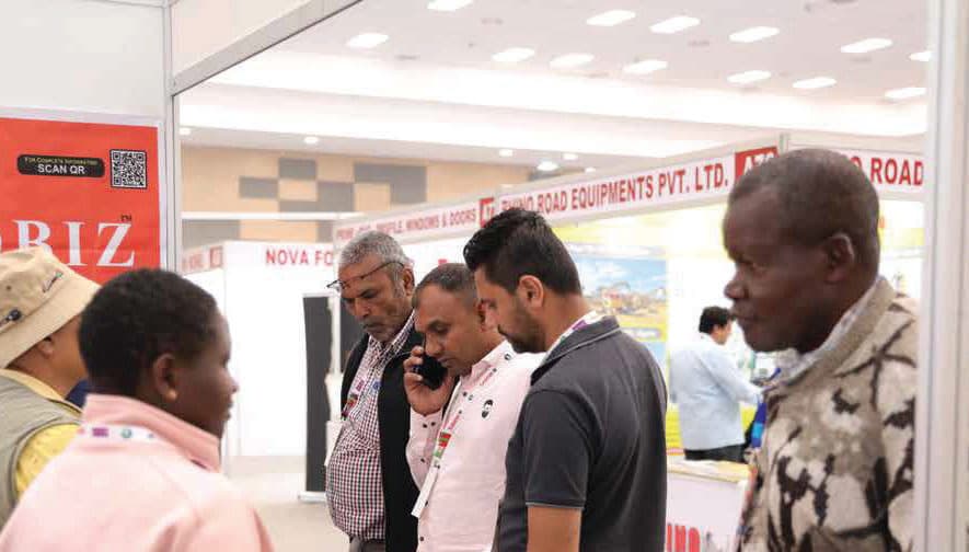 Trade visitors at a Kenya Buildcon exhibitor stand